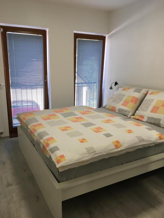 Postel nebo postele na pokoji v ubytování Apartmány SOFIA Kamenice nad Lipou