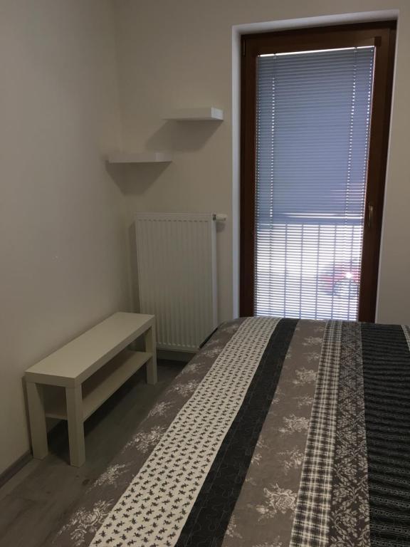 Postel nebo postele na pokoji v ubytování KAMENICE NAD LIPOU, apartmány SOFIA Kamenice nad Lipou