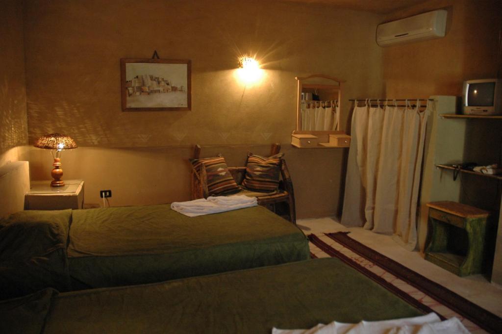 Postel nebo postele na pokoji v ubytování Siwa Shali Resort