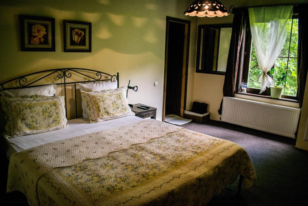 Postel nebo postele na pokoji v ubytování Guest House Verbena