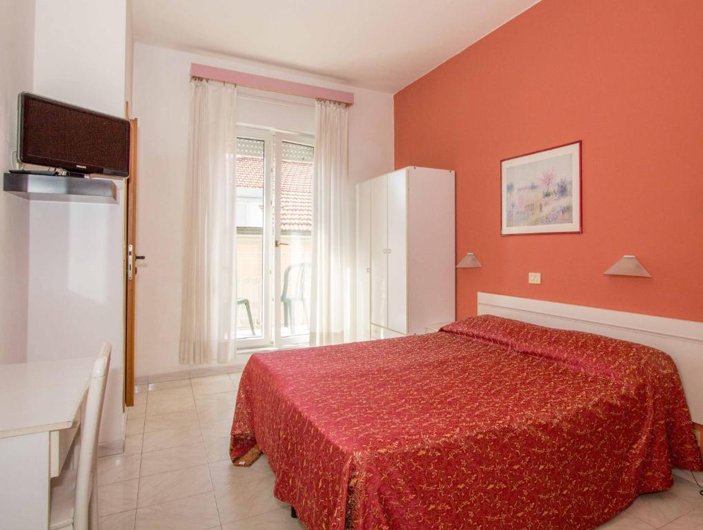 Cama o camas de una habitación en Hotel Regina