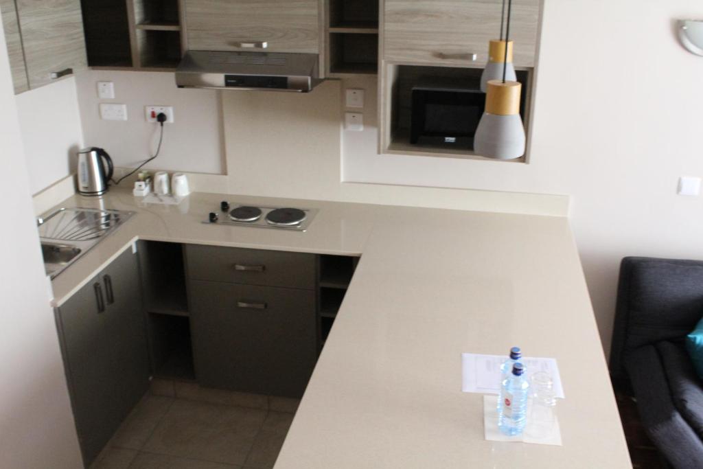 Kuchyň nebo kuchyňský kout v ubytování Hillpark Hotel