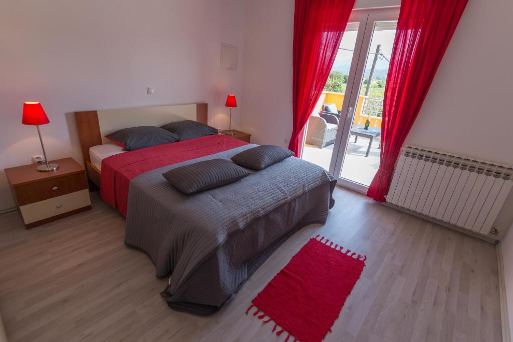 Postel nebo postele na pokoji v ubytování Villa Laura