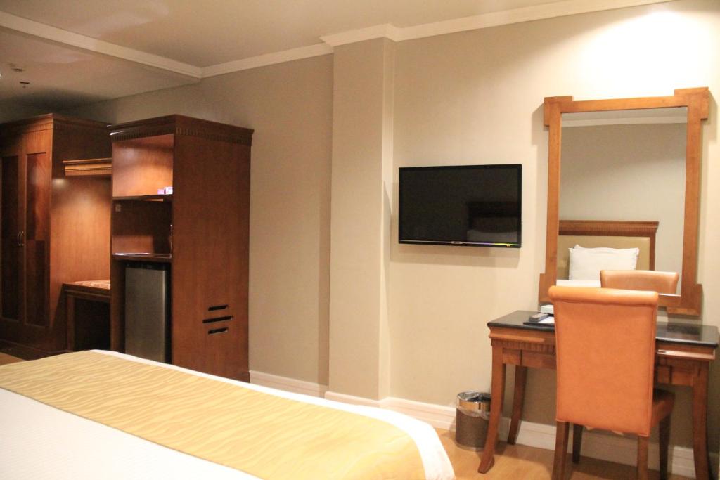 TV a/nebo společenská místnost v ubytování Savannah Resort Hotel