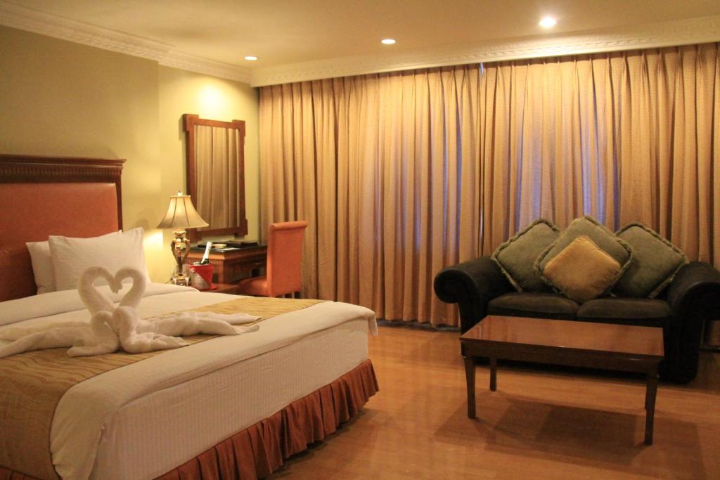 Postel nebo postele na pokoji v ubytování Savannah Resort Hotel