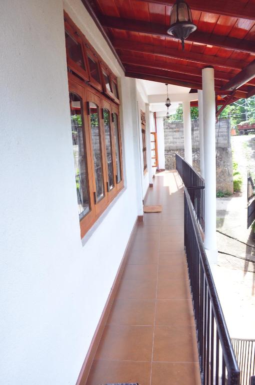 Balkón nebo terasa v ubytování Ajanthas' Homestay