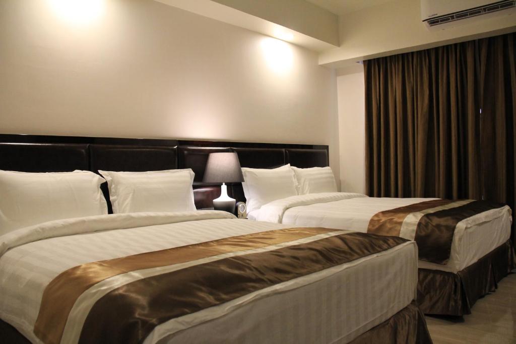 Postel nebo postele na pokoji v ubytování Savannah Resort Hotel