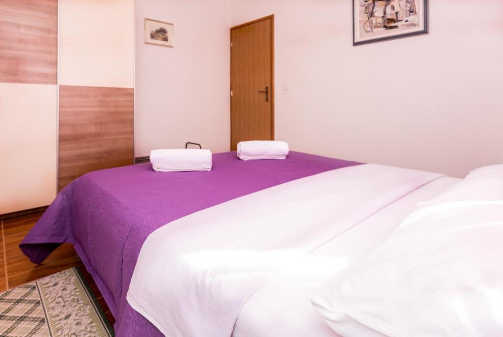 Posteľ alebo postele v izbe v ubytovaní Apartments Blaža