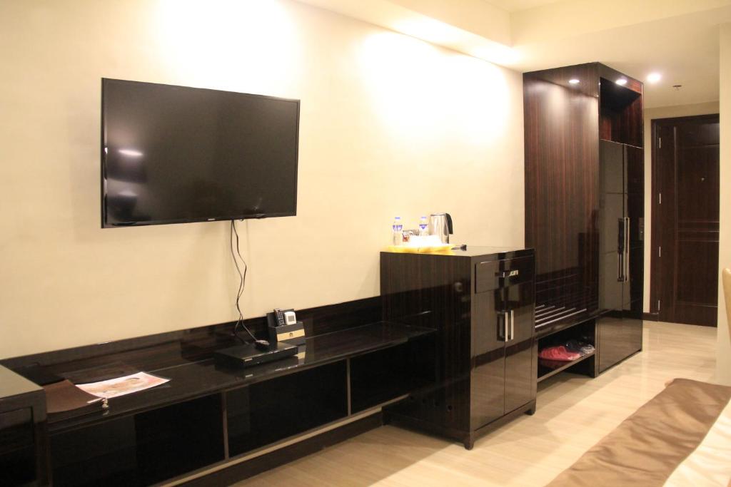 TV a/nebo společenská místnost v ubytování Savannah Resort Hotel