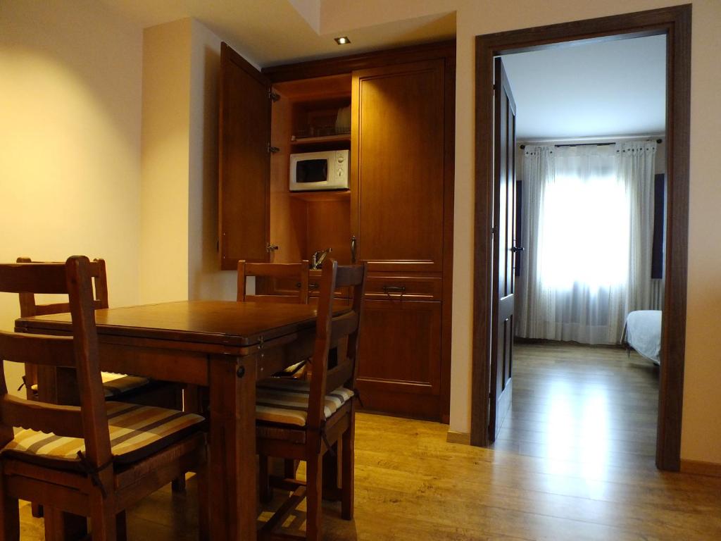 TV a/nebo společenská místnost v ubytování Hotel Areulo