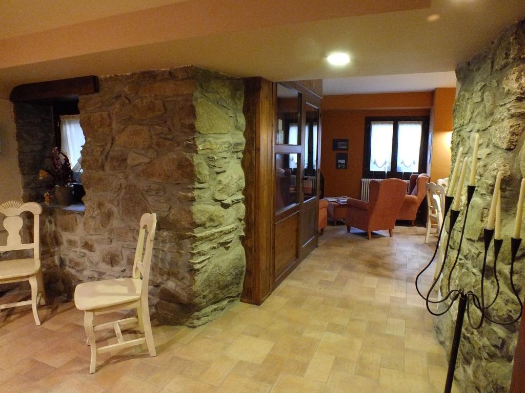 Posezení v ubytování Hotel Areulo