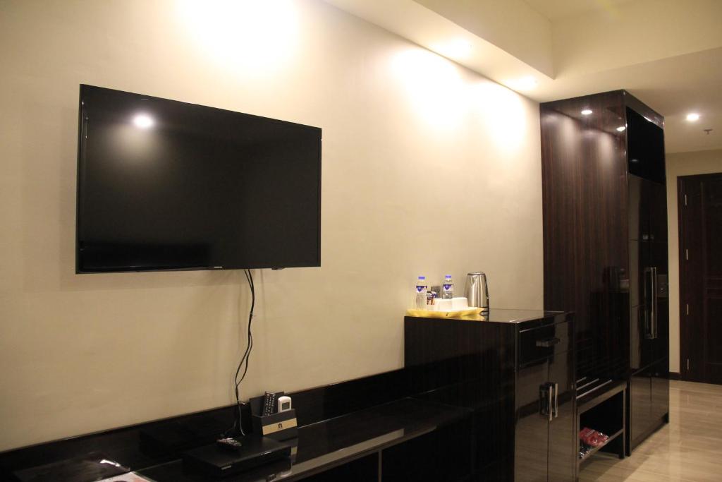 TV a/nebo společenská místnost v ubytování Savannah Resort Hotel