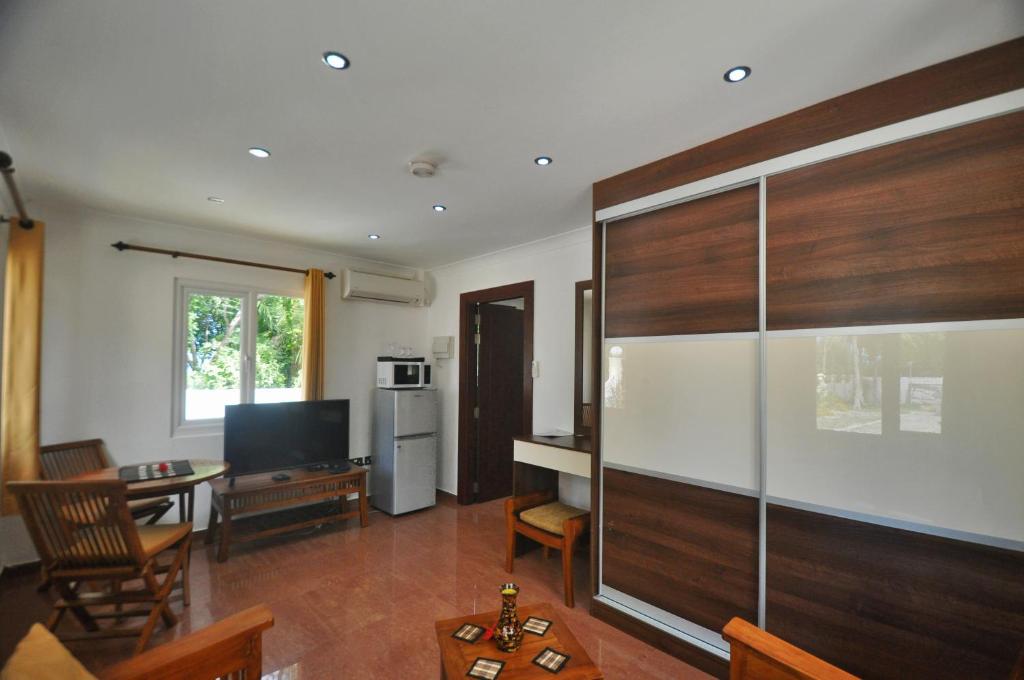 Kuchyň nebo kuchyňský kout v ubytování Yasad Residence