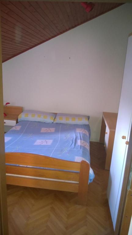 Postel nebo postele na pokoji v ubytování Svetin Apartments