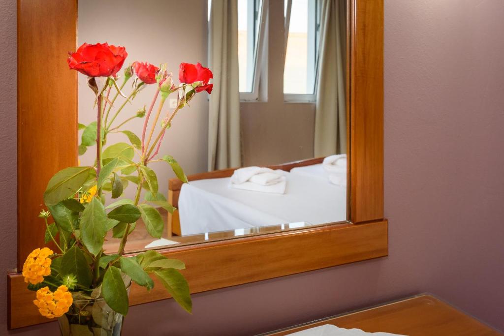 Postel nebo postele na pokoji v ubytování Irinoula Dreams