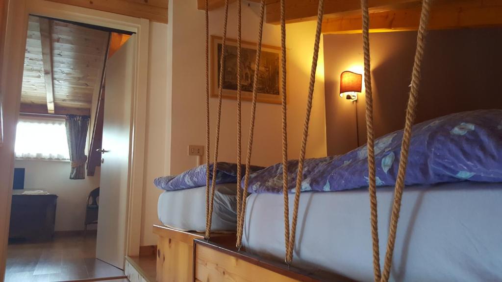 Posteľ alebo postele v izbe v ubytovaní Trattoria Traversi
