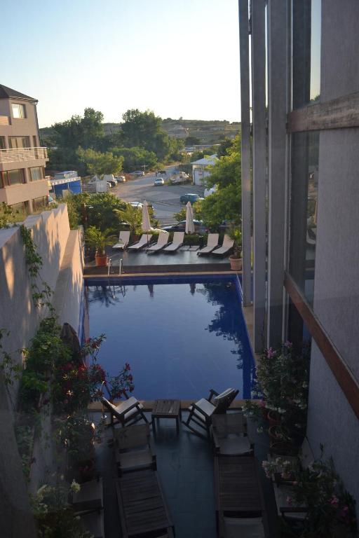 The swimming pool at or close to Design Hotel Logatero