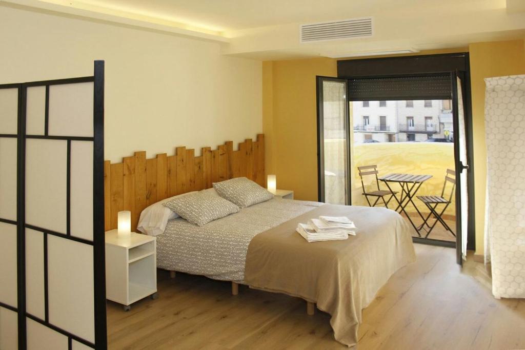 Katil atau katil-katil dalam bilik di Alojamientos Dezerto Bardenas