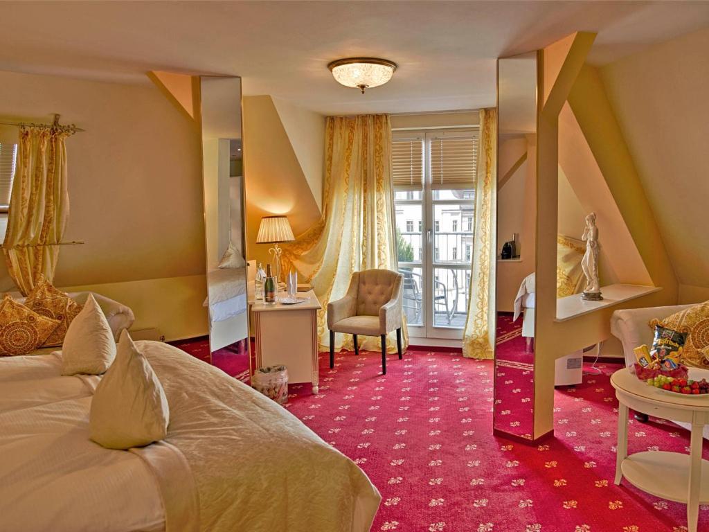 Postel nebo postele na pokoji v ubytování Hotel Augusta Am Kurfürstendamm
