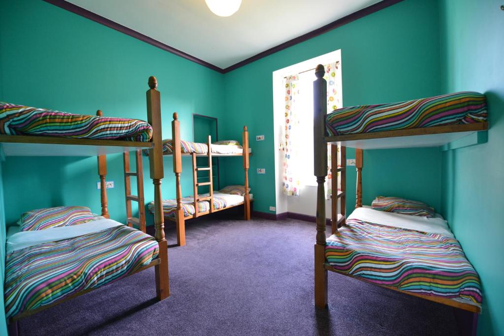 Postel nebo postele na pokoji v ubytování Oban Backpackers