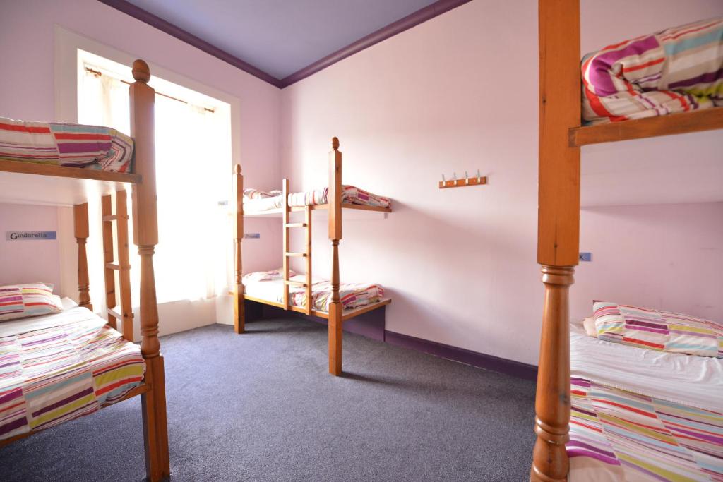 Postel nebo postele na pokoji v ubytování Oban Backpackers