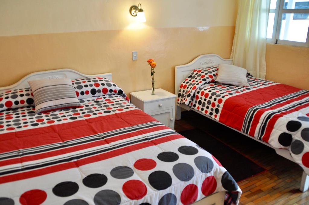 Postel nebo postele na pokoji v ubytování Hotel Europa