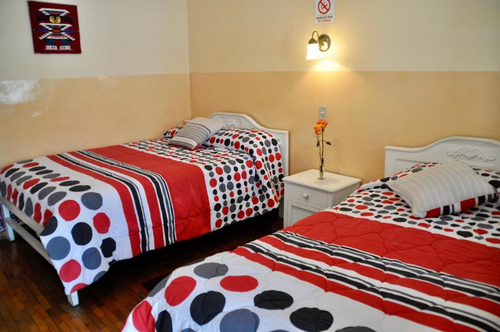 Postel nebo postele na pokoji v ubytování Hotel Europa