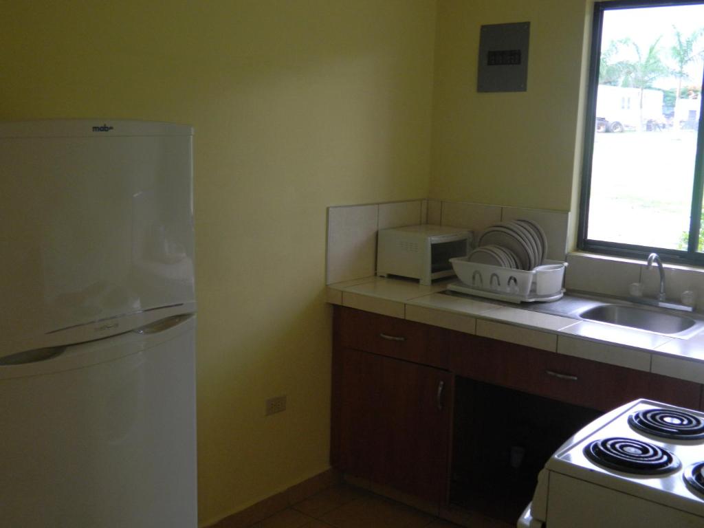 Kuchyň nebo kuchyňský kout v ubytování Hotel Santa Maria de Comayagua