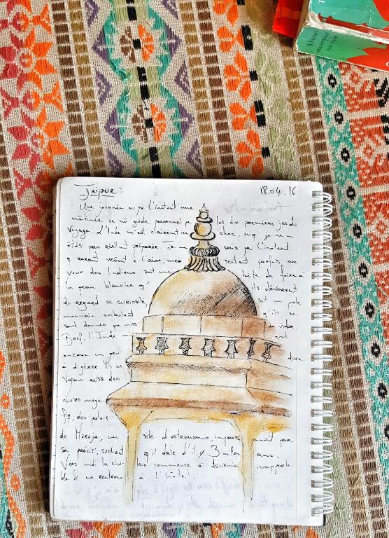 a notebook with a drawing of a mosque at JHouse near Bhikaji in New Delhi