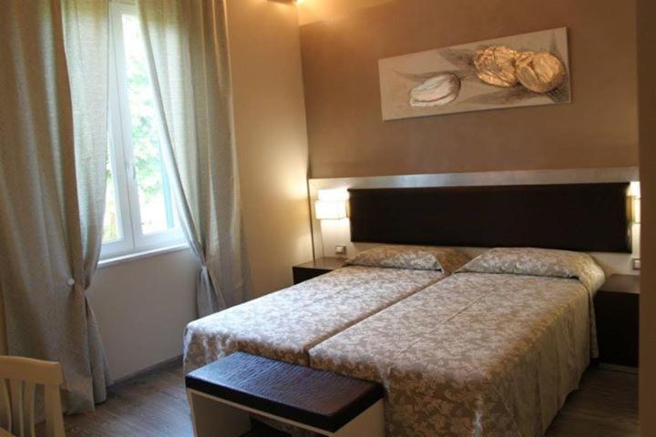Postel nebo postele na pokoji v ubytování Il Viale b&b