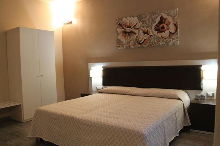 Postel nebo postele na pokoji v ubytování Il Viale b&b