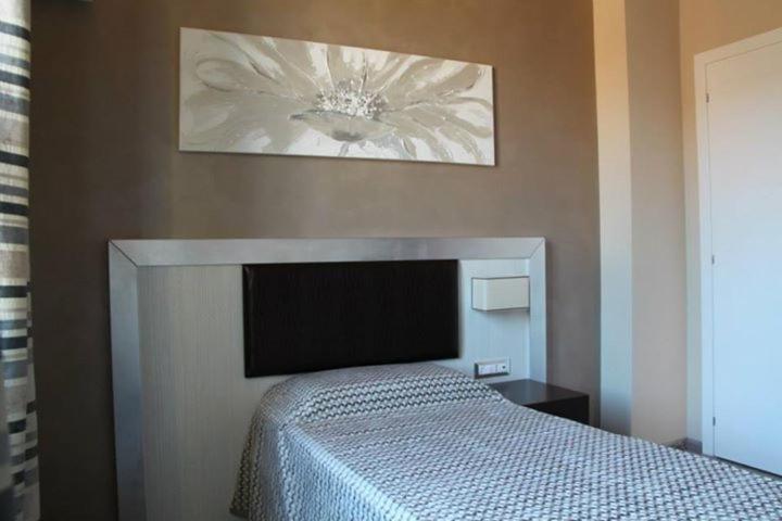 Postel nebo postele na pokoji v ubytování Il Viale b&b