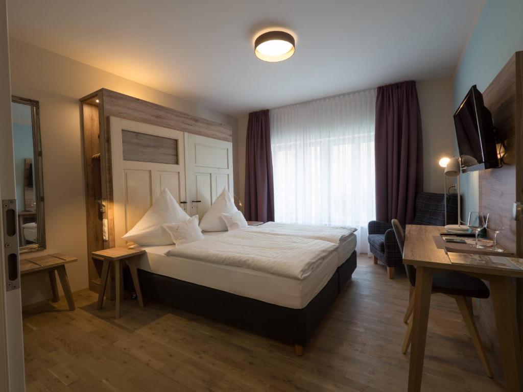Postel nebo postele na pokoji v ubytování Hotel - Weinbar FAHR AWAY