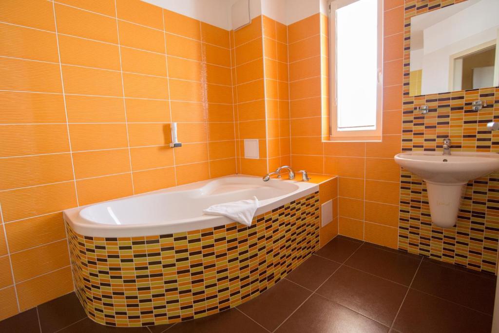 Koupelna v ubytování Hotel Olympionik