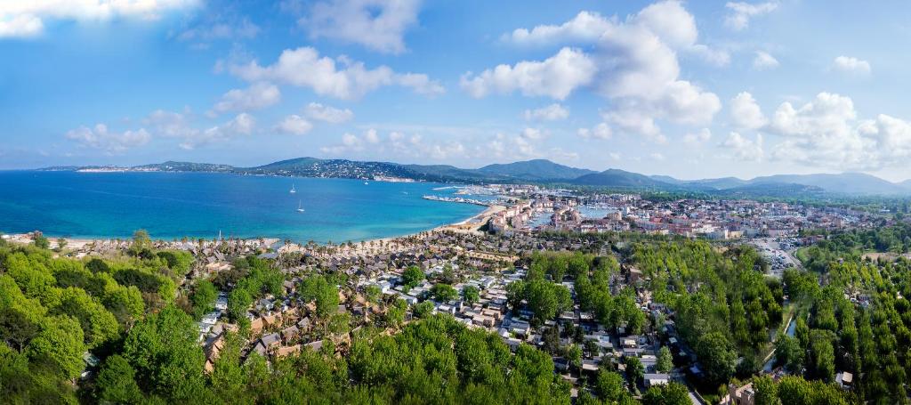 an aerial view of a city and the ocean at Cote d'Azur Holidays in Grimaud