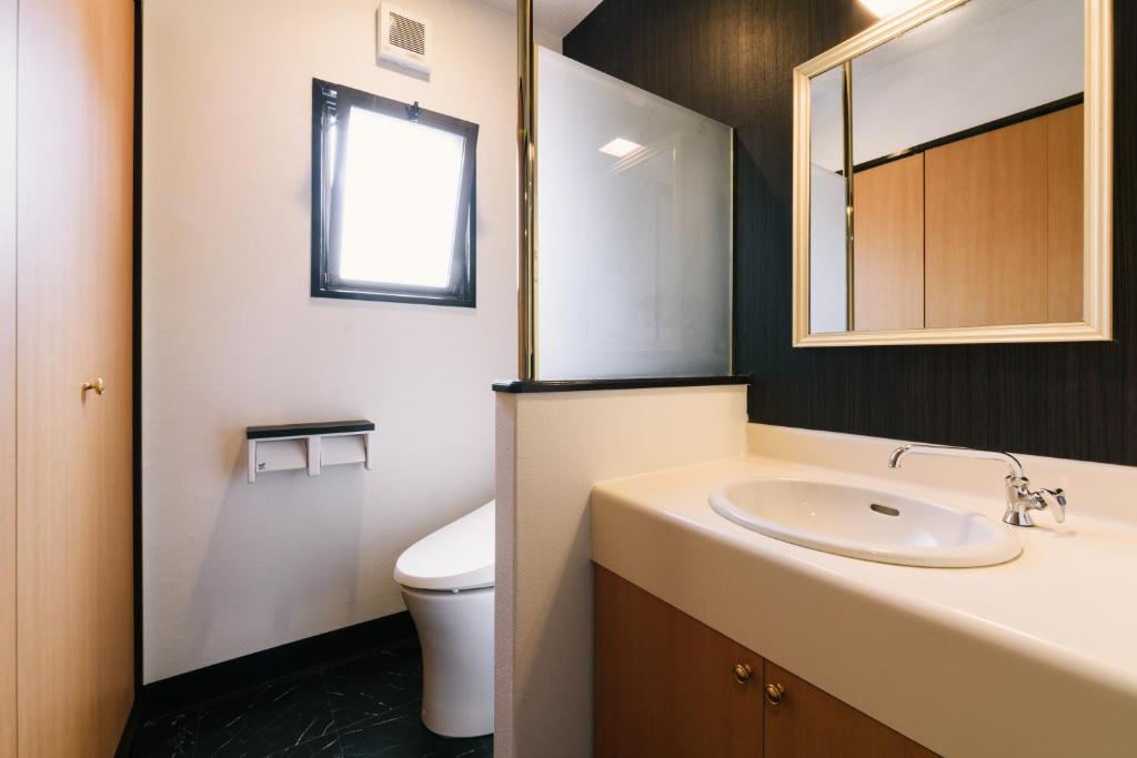 Koupelna v ubytování Guest House Yasuragi Hakataekimae