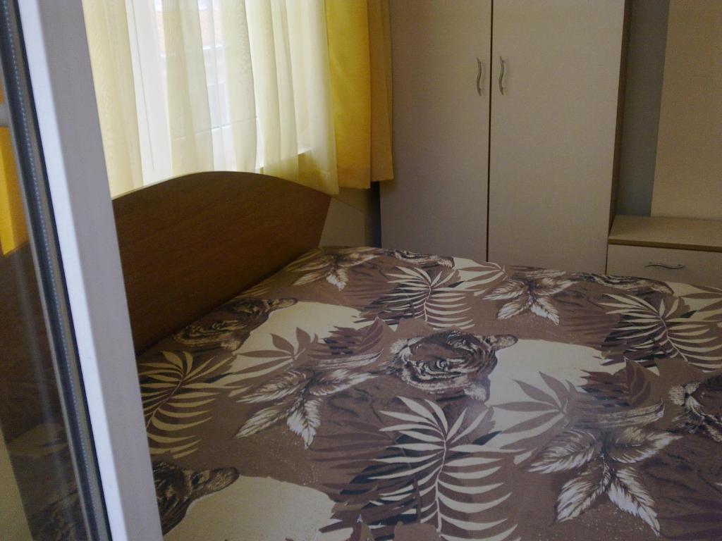 Postel nebo postele na pokoji v ubytování Apart Hotel Hetodon