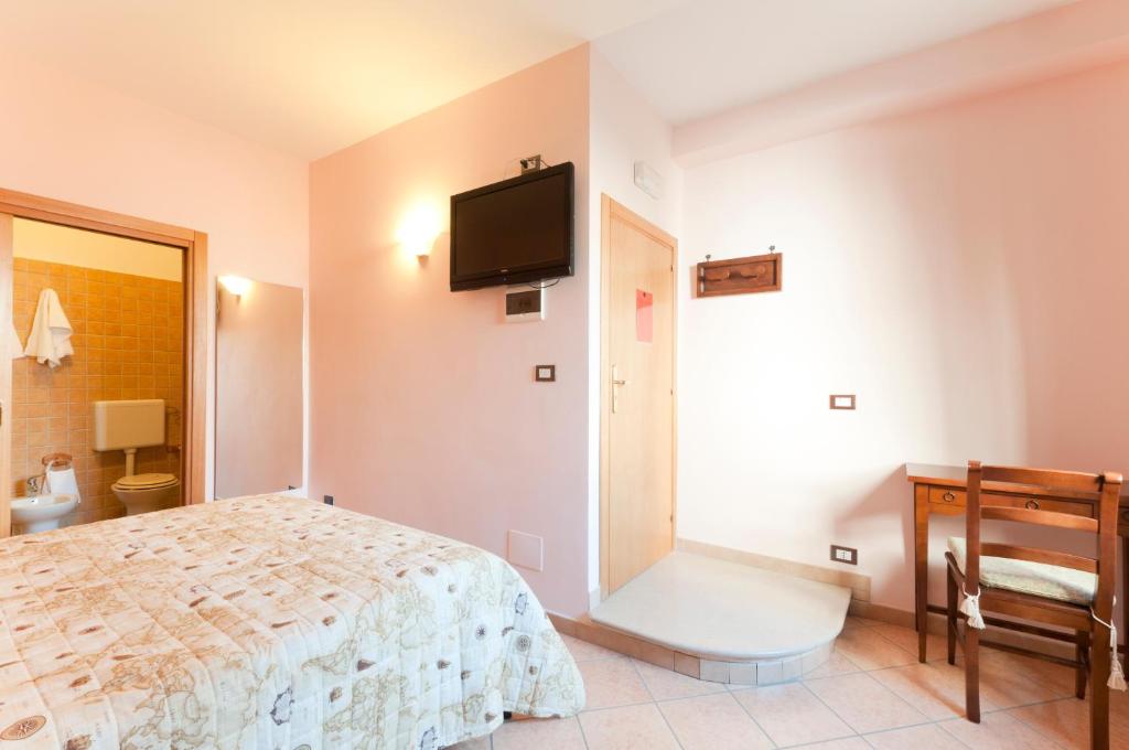 Postel nebo postele na pokoji v ubytování B&B La Dimora