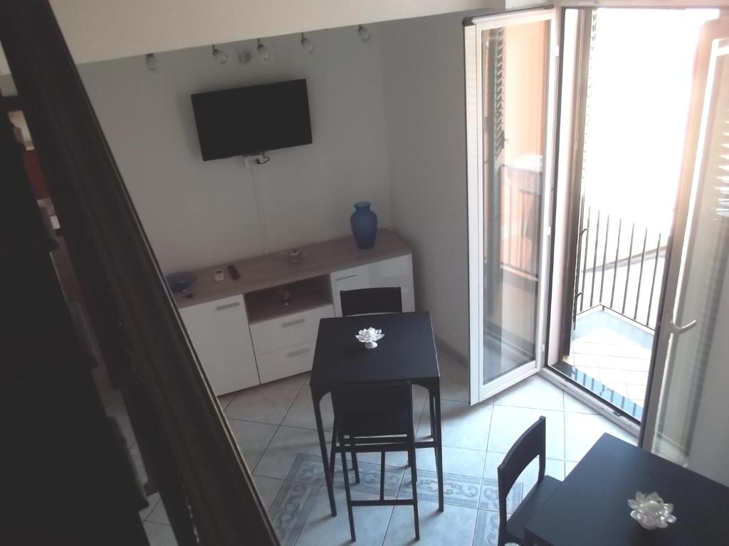 TV a/nebo společenská místnost v ubytování B&B del Mare