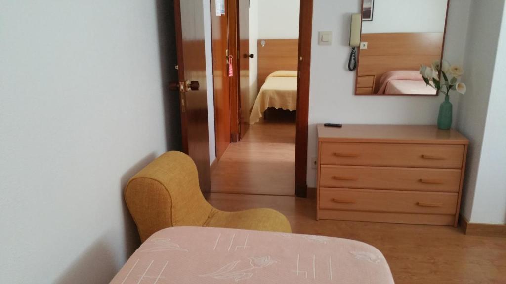 Postel nebo postele na pokoji v ubytování Hotel A Roda