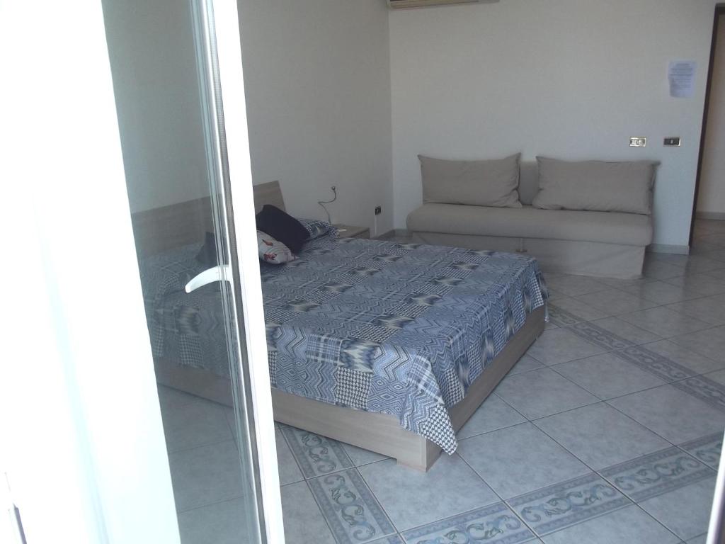 Postel nebo postele na pokoji v ubytování B&B del Mare