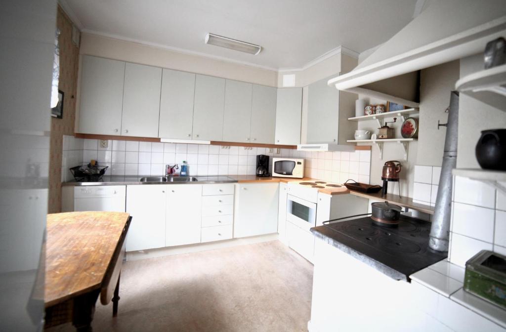 Kuchyň nebo kuchyňský kout v ubytování Prästgatanett Apartments