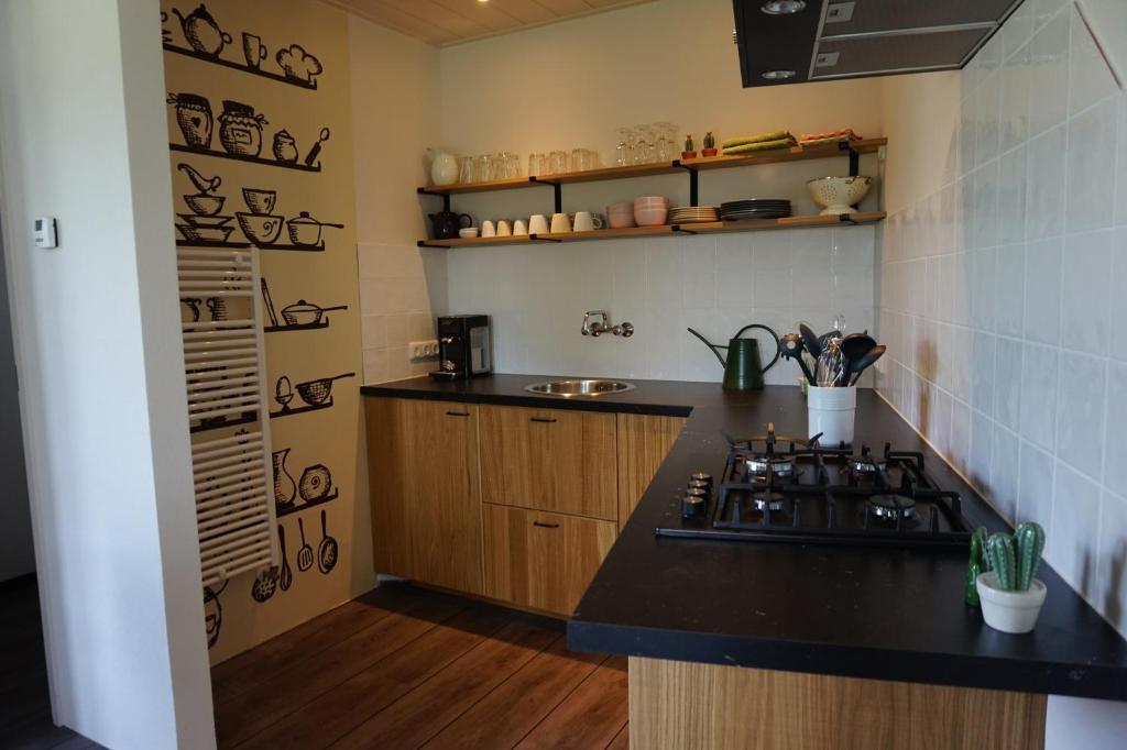 Kuchyň nebo kuchyňský kout v ubytování B&B Johannesberg