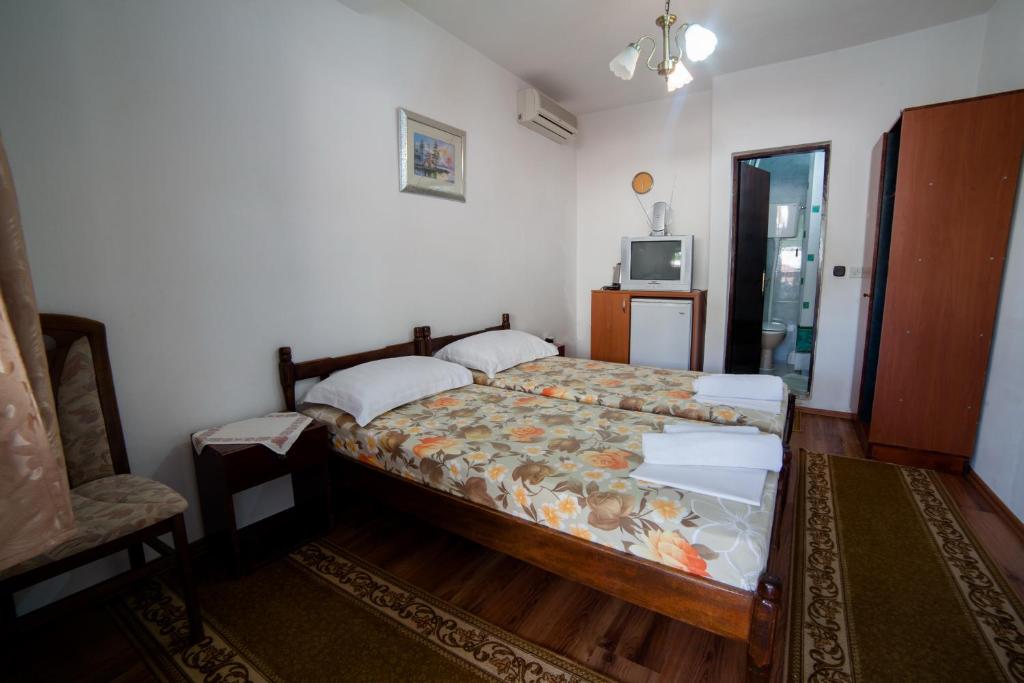Letto o letti in una camera di Guesthouse Sidro