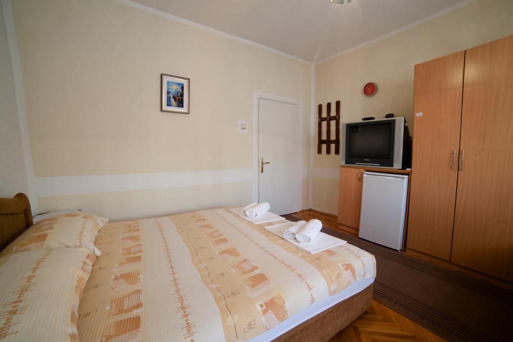 Letto o letti in una camera di Guesthouse Sidro