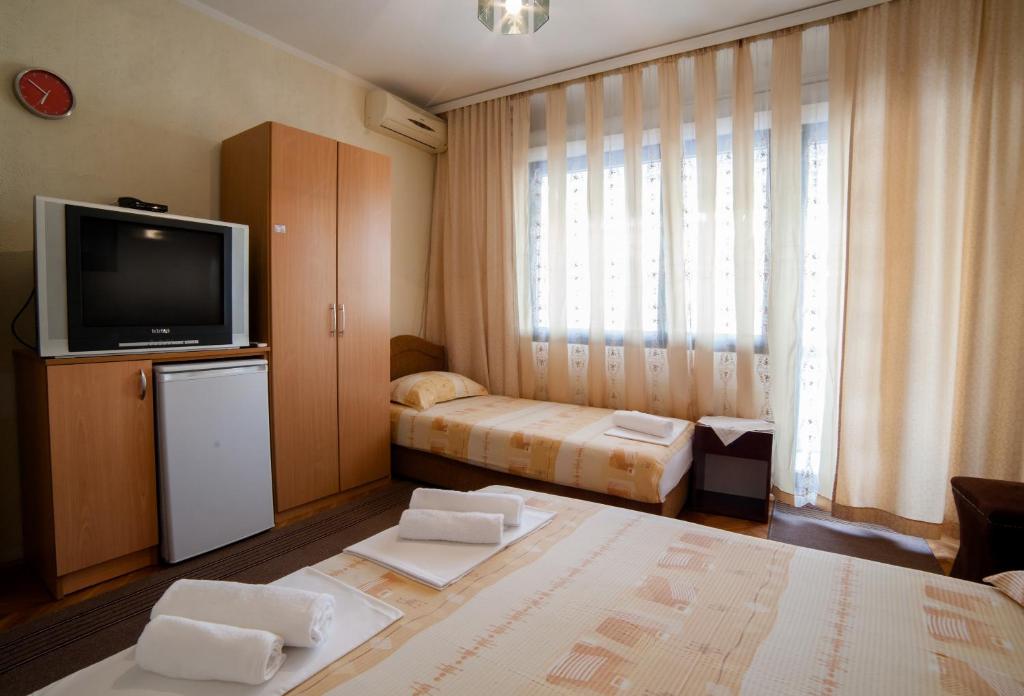 Letto o letti in una camera di Guesthouse Sidro