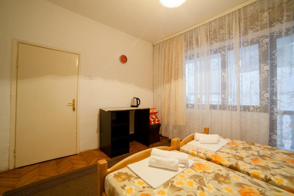 Letto o letti in una camera di Guesthouse Sidro