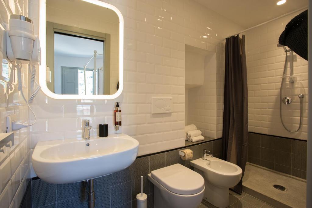 Koupelna v ubytování Intervallo Boutique Hotel