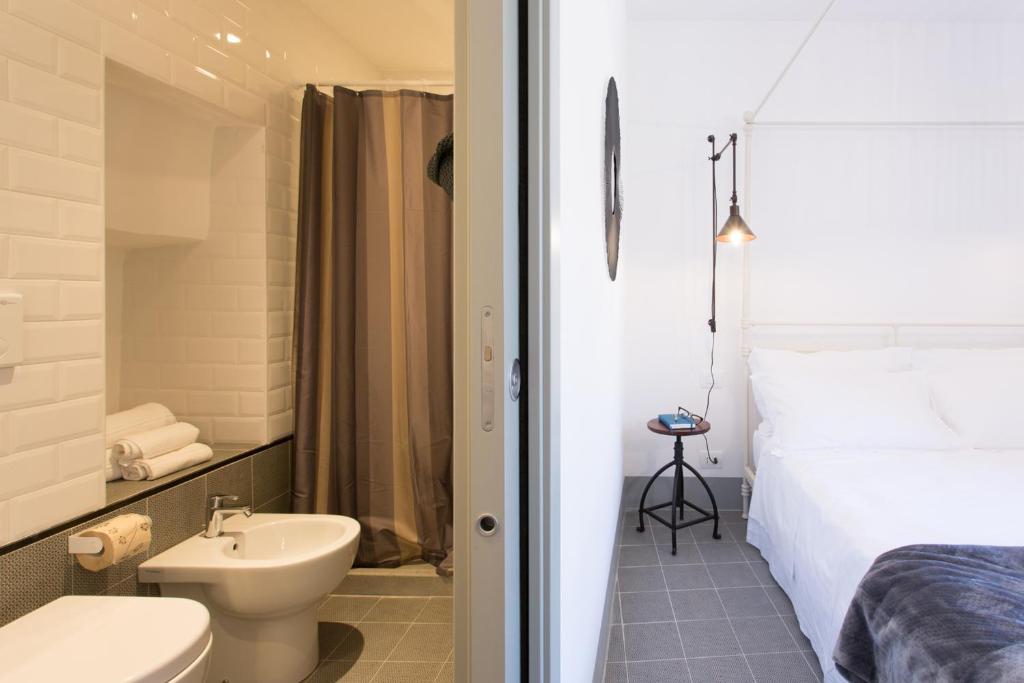 Koupelna v ubytování Intervallo Boutique Hotel