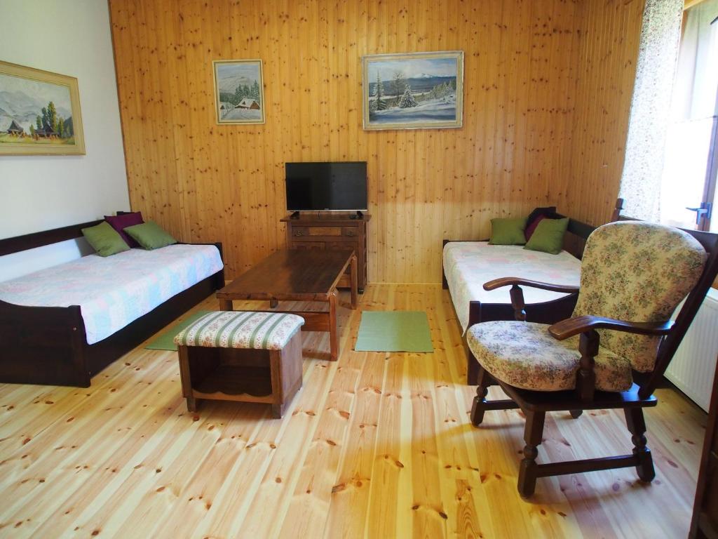 Postel nebo postele na pokoji v ubytování Chalupa za Křížkem